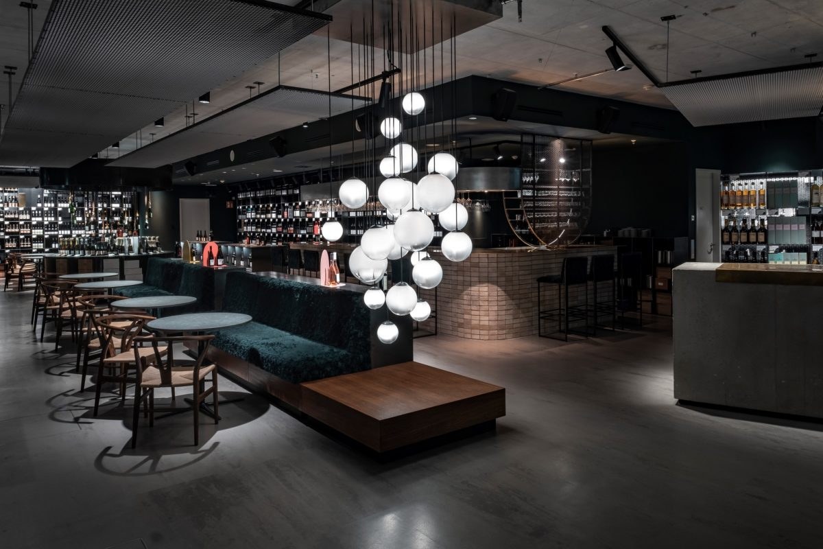 Projektfoto GREGORS boutique vinothek – Material, Licht und Ausbau